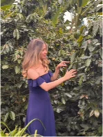 Woman among the coffee trees on the farm